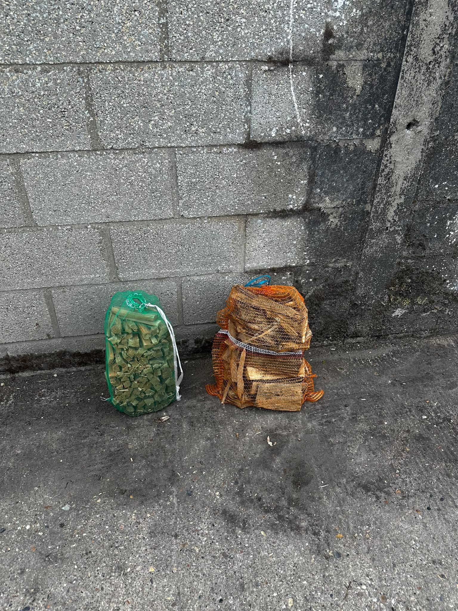 Green standard kindling and orange eco kindling bags