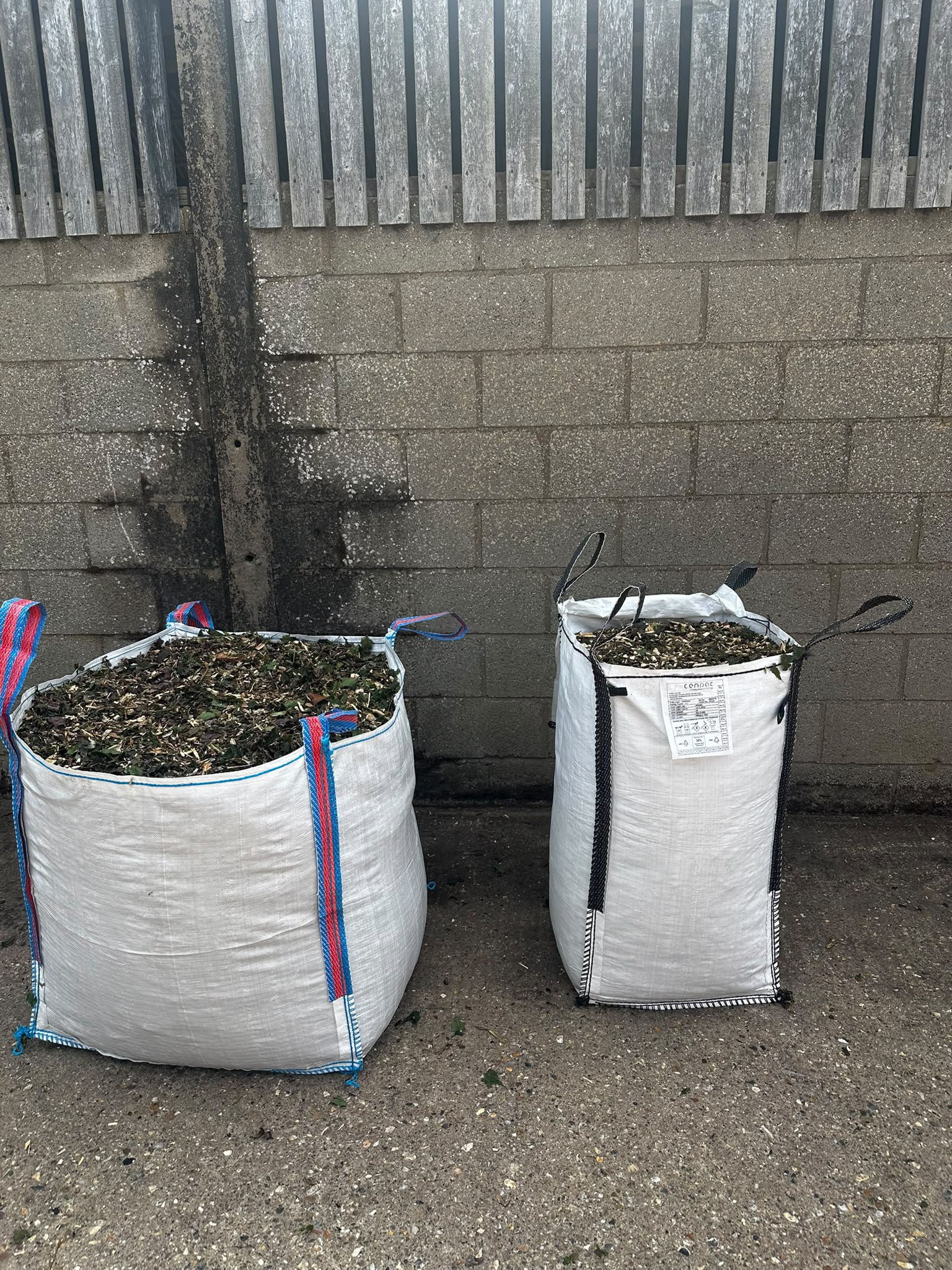 Two bag sizes filled with woodland mulch