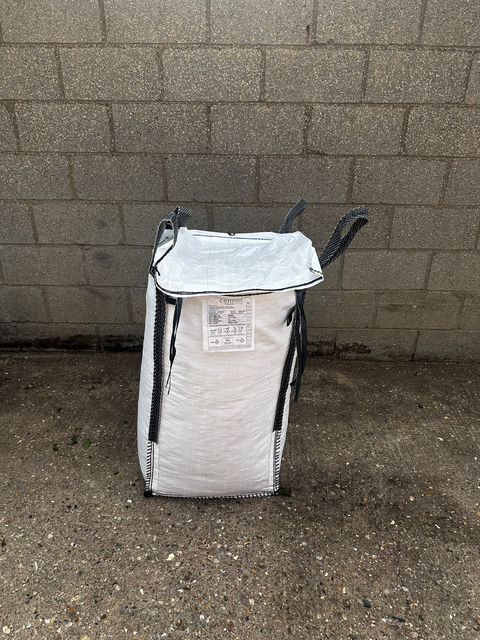 Covered bag of woodland mulch