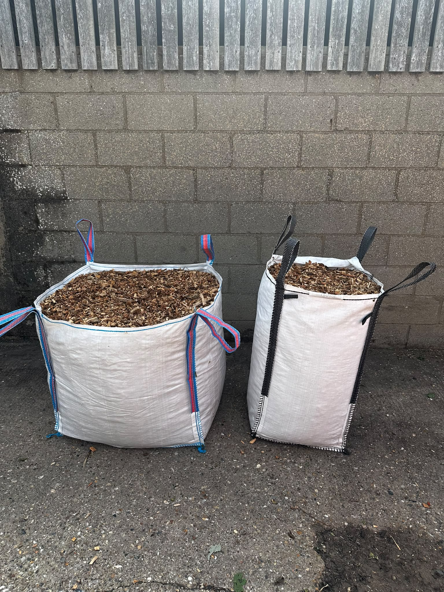 Two bag sizes filled with clean woodchip